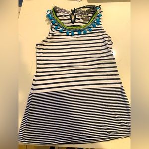 Eclectic Anthropologie tank top with Pom Poms, tie back detail. Lightly worn!